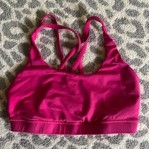 Bright pink, Lululemon sports bra.